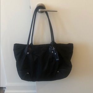 Tumi black handbag